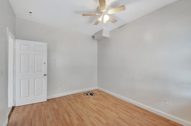 701 S J St, Lake Worth Beach, FL 33460 - unfurnished room with wood finished floors, baseboards, and ceiling fan