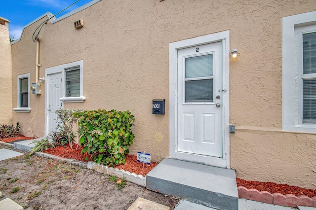 701 S J St, Lake Worth Beach, FL 33460 - view of exterior entry with stucco siding