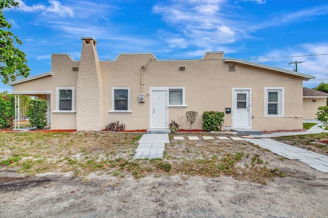 701 S J St, Lake Worth Beach, FL 33460 - view of front of home with stucco siding