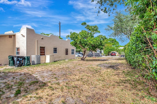 701 S J St, Lake Worth Beach, FL 33460 - view of yard featuring central AC unit