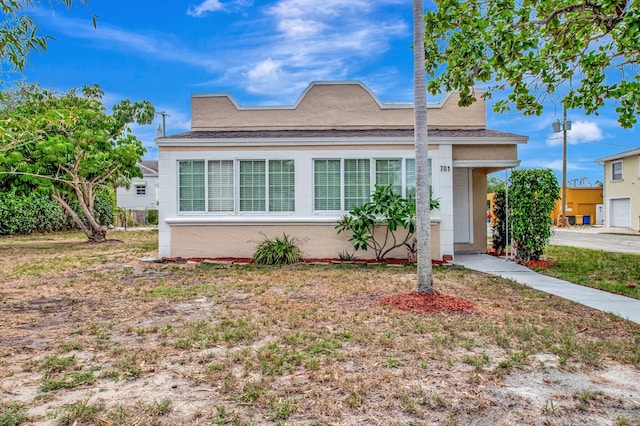 701 S J St, Lake Worth Beach, FL 33460 - view of front of property featuring stucco siding