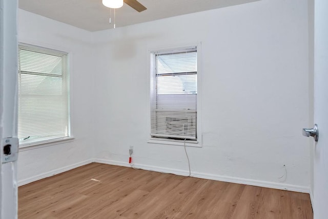 713 10th Ave N, Lake Worth Beach, FL 33460 - unfurnished room featuring baseboards, light wood-style flooring, and a ceiling fan