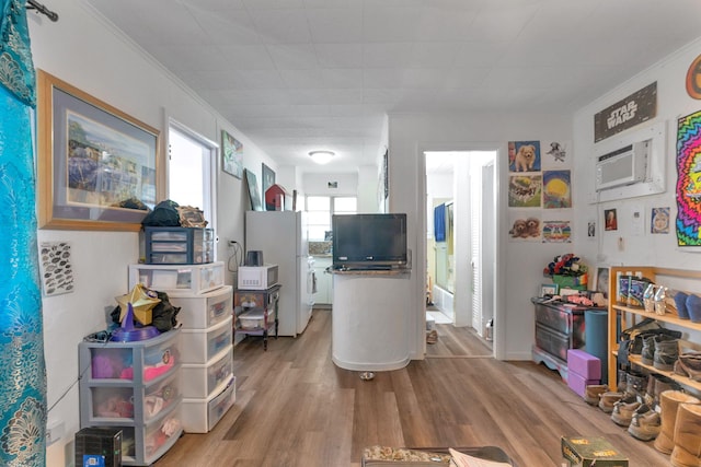 713 10th Ave N, Lake Worth Beach, FL 33460 - living room featuring wood finished floors and ornamental molding