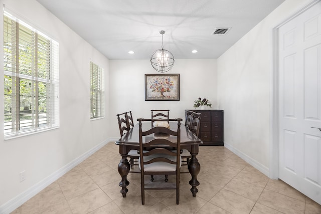 2757 Wymberly Dr, Jupiter, FL 33458 - dining area with a chandelier, baseboards, light tile patterned floors, and recessed lighting