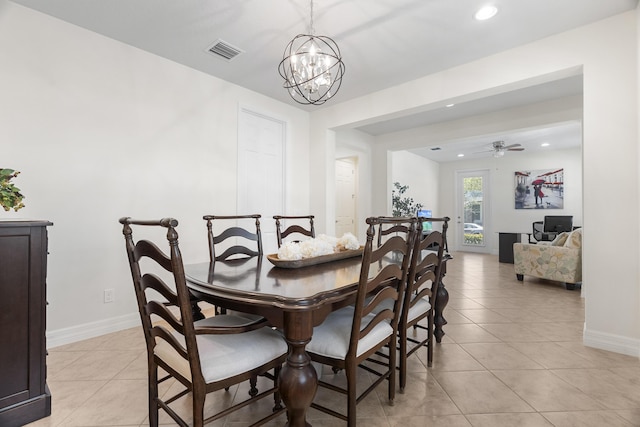 2757 Wymberly Dr, Jupiter, FL 33458 - dining area featuring a chandelier, light tile patterned floors, baseboards, and recessed lighting