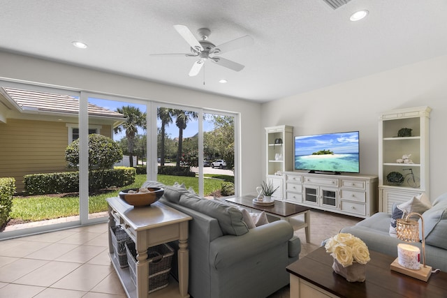 2757 Wymberly Dr, Jupiter, FL 33458 - living room featuring tile patterned floors, ceiling fan, and recessed lighting