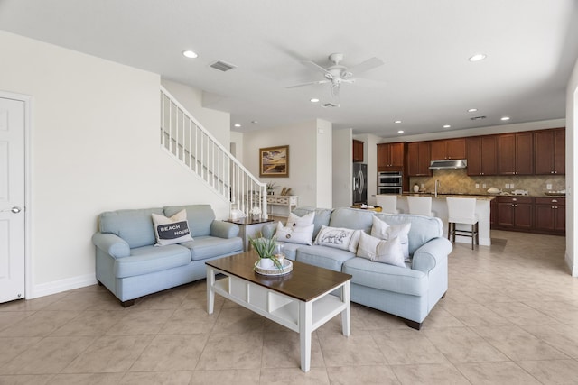 2757 Wymberly Dr, Jupiter, FL 33458 - living area with ceiling fan, light tile patterned floors, recessed lighting, and stairway