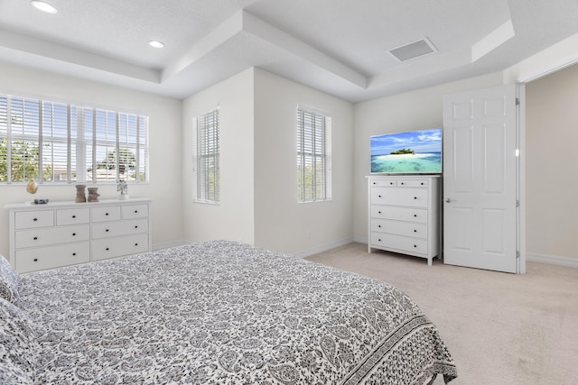 2757 Wymberly Dr, Jupiter, FL 33458 - bedroom featuring a raised ceiling, light carpet, multiple windows, and recessed lighting
