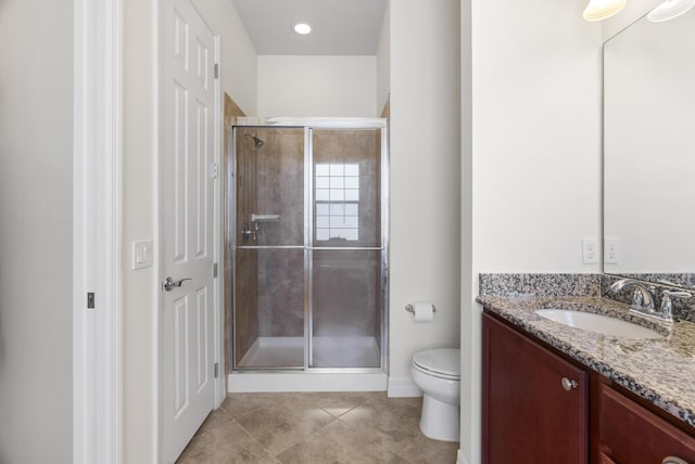 2757 Wymberly Dr, Jupiter, FL 33458 - bathroom with toilet, vanity, a stall shower, tile patterned floors, and baseboards