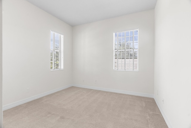 2757 Wymberly Dr, Jupiter, FL 33458 - empty room with carpet floors and baseboards