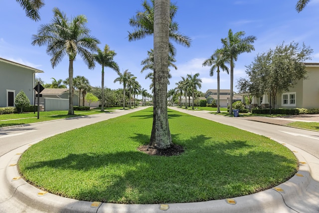2757 Wymberly Dr, Jupiter, FL 33458 - surrounding community with a lawn and a residential view