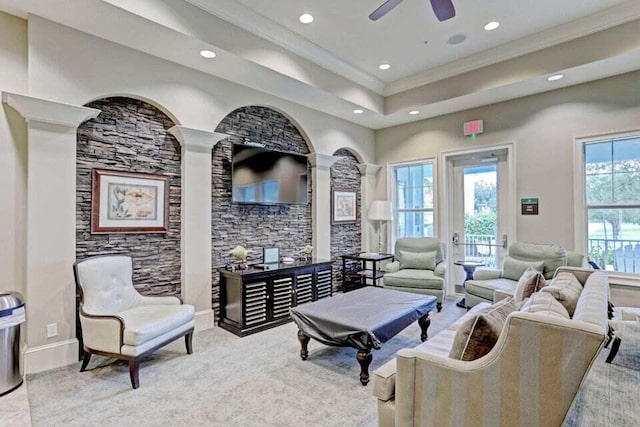 2757 Wymberly Dr, Jupiter, FL 33458 - living room featuring recessed lighting, ornate columns, ceiling fan, crown molding, and a raised ceiling