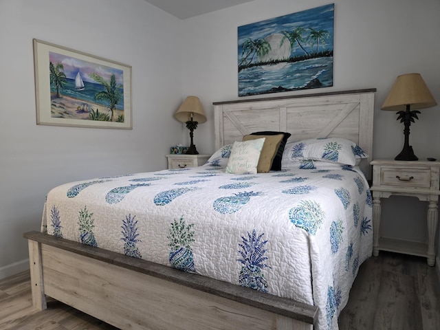319 N J St, Lake Worth Beach, FL 33460 - bedroom featuring wood finished floors and baseboards
