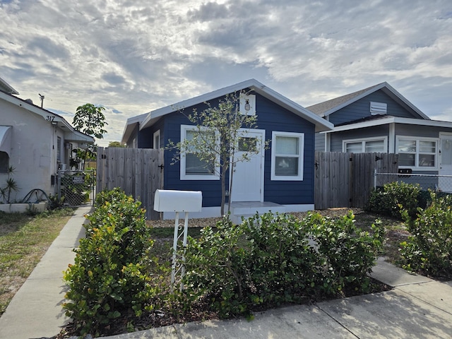 319 N J St, Lake Worth Beach, FL 33460 - view of front of home featuring a gate