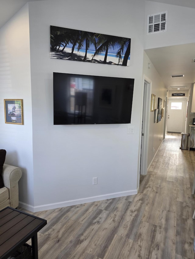 319 N J St, Lake Worth Beach, FL 33460 - living room featuring wood finished floors and baseboards