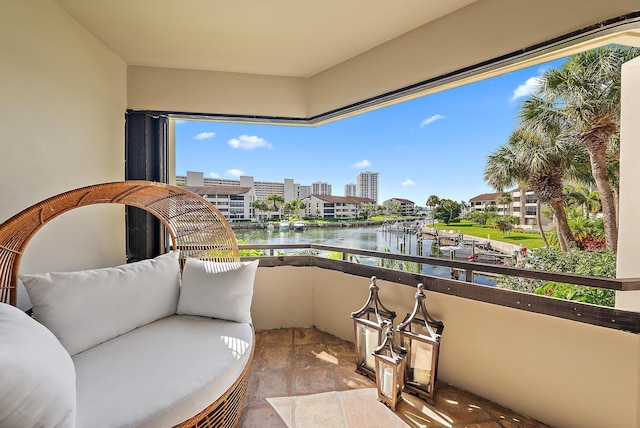 1124 Marine Way W D2R + Boat Slip 19, North Palm Beach, FL 33408 - balcony featuring a water view and outdoor lounge area
