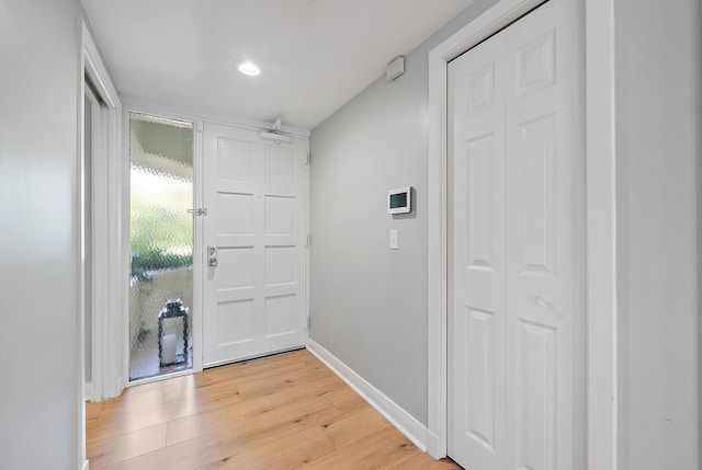 1124 Marine Way W D2R + Boat Slip 19, North Palm Beach, FL 33408 - entryway featuring light wood-type flooring, baseboards, and recessed lighting