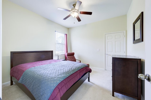 17560 72nd Rd N, The Acreage, FL 33470 - bedroom with light colored carpet, baseboards, and a ceiling fan