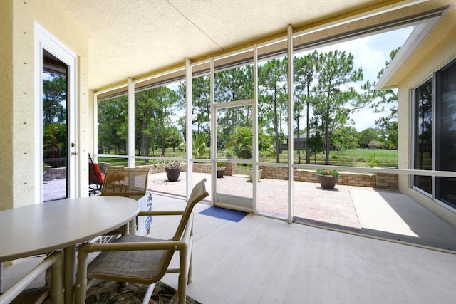 17560 72nd Rd N, The Acreage, FL 33470 - sunroom / solarium with outdoor dining space