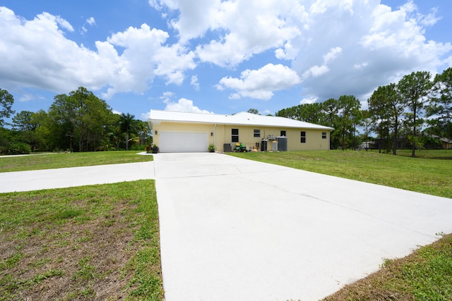 17560 72nd Rd N, The Acreage, FL 33470 - single story home featuring driveway, a front lawn, and an attached garage