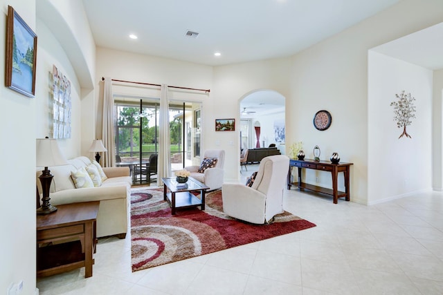17560 72nd Rd N, The Acreage, FL 33470 - tiled living room featuring arched walkways and recessed lighting