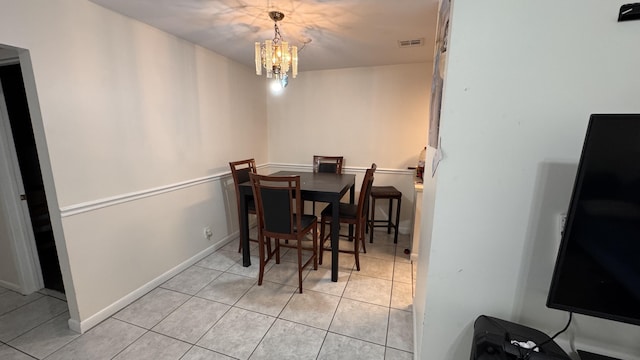 1301 Waterview Cir, Palm Springs, FL 33461 - dining room featuring tile patterned floors and a chandelier