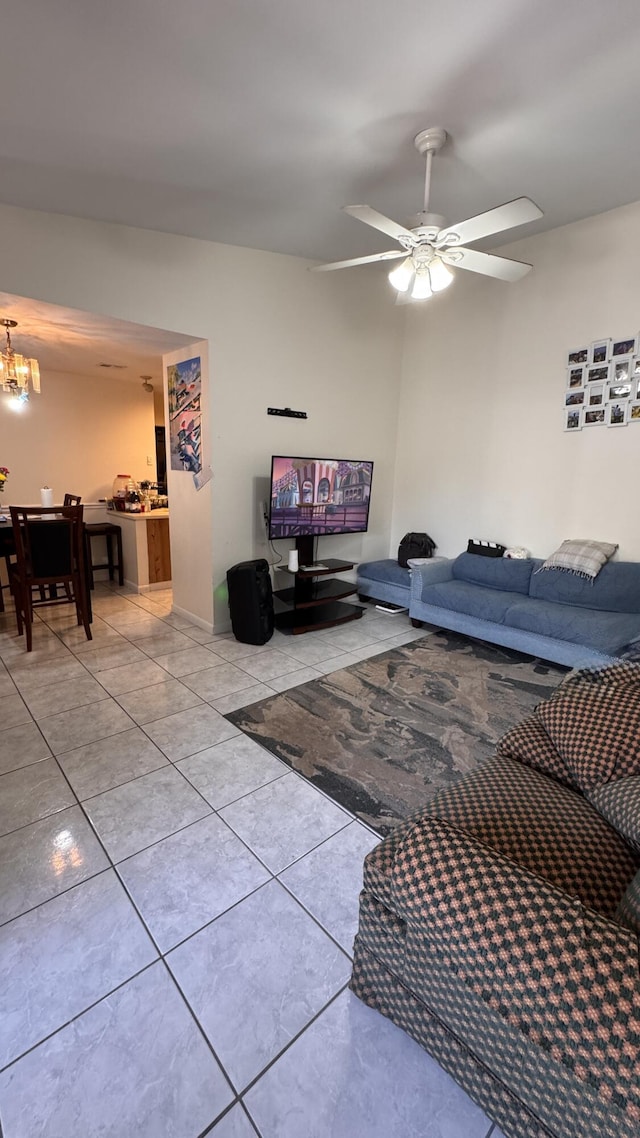 1301 Waterview Cir, Palm Springs, FL 33461 - tiled living area featuring a chandelier and ceiling fan