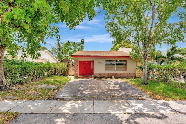 6160 SW 4th St, Margate, FL 33068 - view of front of house with brick siding, asphalt driveway, and stucco siding