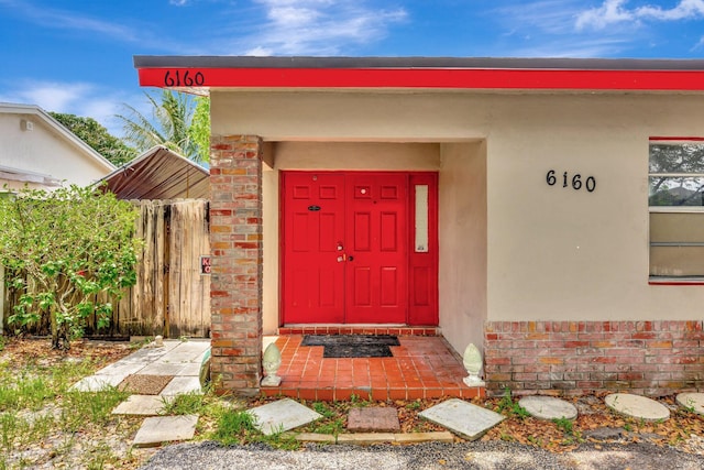 6160 SW 4th St, Margate, FL 33068 - doorway to property with stucco siding