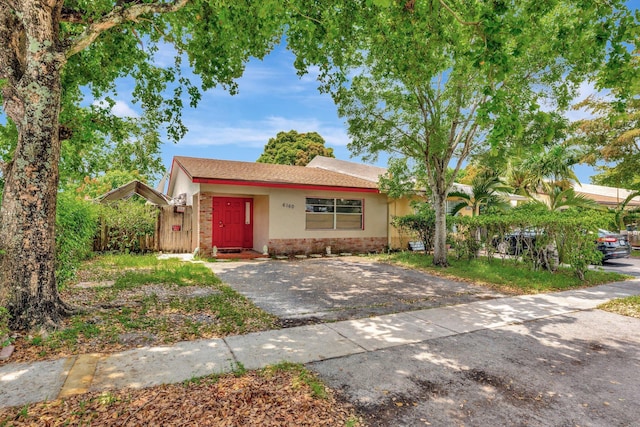 6160 SW 4th St, Margate, FL 33068 - view of front of property featuring driveway, brick siding, and stucco siding