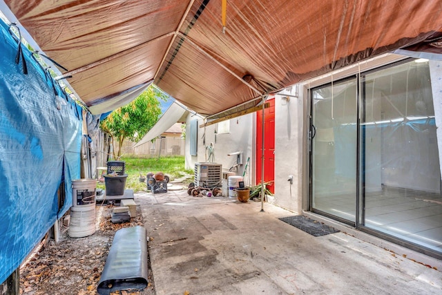 6160 SW 4th St, Margate, FL 33068 - view of patio / terrace featuring electric panel and central AC