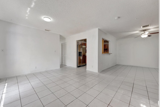 6160 SW 4th St, Margate, FL 33068 - unfurnished room featuring a textured ceiling, a ceiling fan, light tile patterned flooring, a smoke detector, and baseboards
