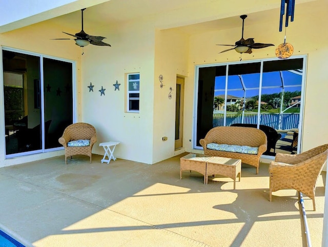 3104 SW Porpoise Cir, Stuart, FL 34997 - view of patio with a ceiling fan and an outdoor hangout area