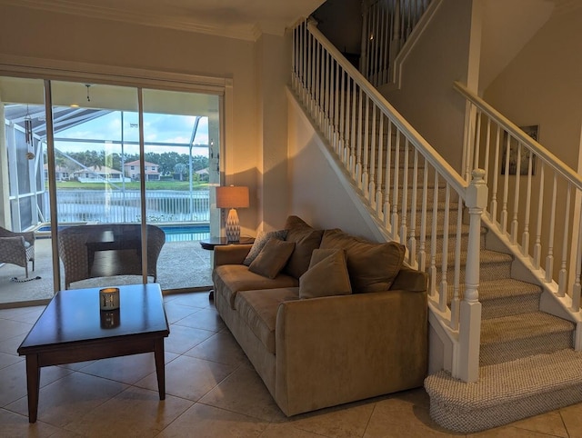 3104 SW Porpoise Cir, Stuart, FL 34997 - tiled living area with a sunroom, ornamental molding, and stairway