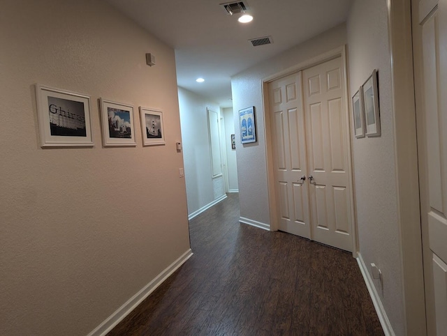 3104 SW Porpoise Cir, Stuart, FL 34997 - hall featuring dark wood-style floors, baseboards, and recessed lighting