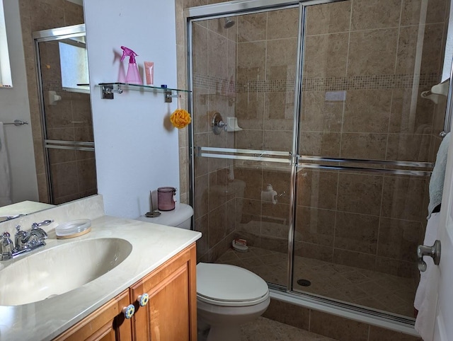 3104 SW Porpoise Cir, Stuart, FL 34997 - bathroom with a stall shower, toilet, and vanity