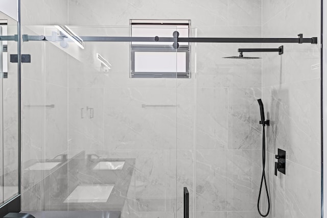 620 Raintree St E, Lehigh Acres, FL 33974 - bathroom featuring a shower stall