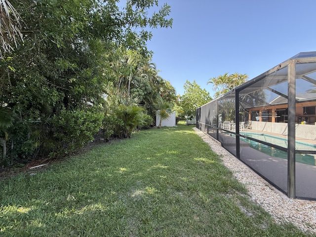 1810 Eucalyptus Ave, Fort Pierce, FL 34949 - view of green lawn featuring glass enclosure