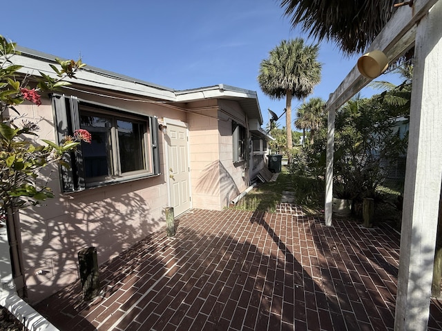 1810 Eucalyptus Ave, Fort Pierce, FL 34949 - view of property exterior with a patio