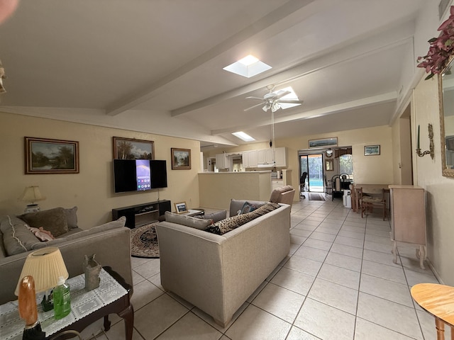 1810 Eucalyptus Ave, Fort Pierce, FL 34949 - living area featuring light tile patterned floors, a skylight, beamed ceiling, and ceiling fan