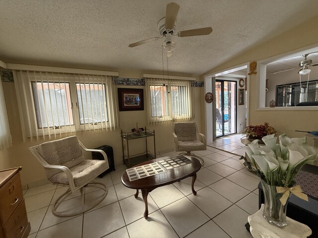 1810 Eucalyptus Ave, Fort Pierce, FL 34949 - living area with ceiling fan, a textured ceiling, and light tile patterned floors