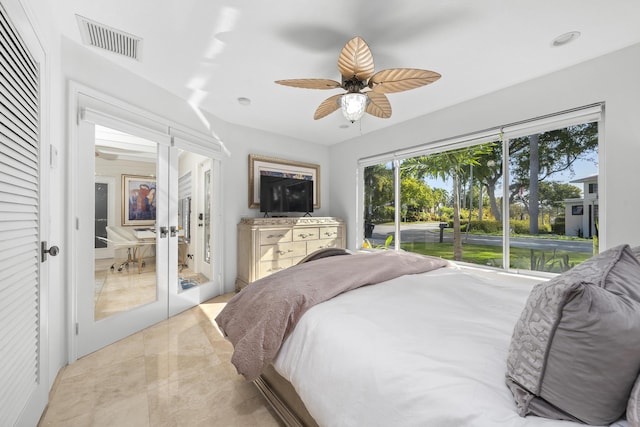 1501 S Palmway, Lake Worth, FL 33460 - bedroom with french doors, ceiling fan, and access to outside