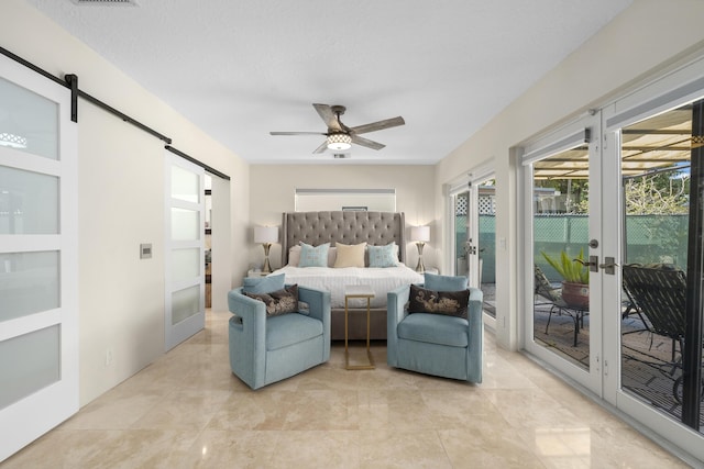 1501 S Palmway, Lake Worth, FL 33460 - bedroom with a barn door, french doors, access to exterior, and multiple windows
