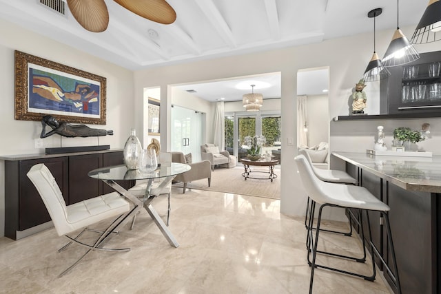 1501 S Palmway, Lake Worth, FL 33460 - dining area with light marble finish floors and beam ceiling