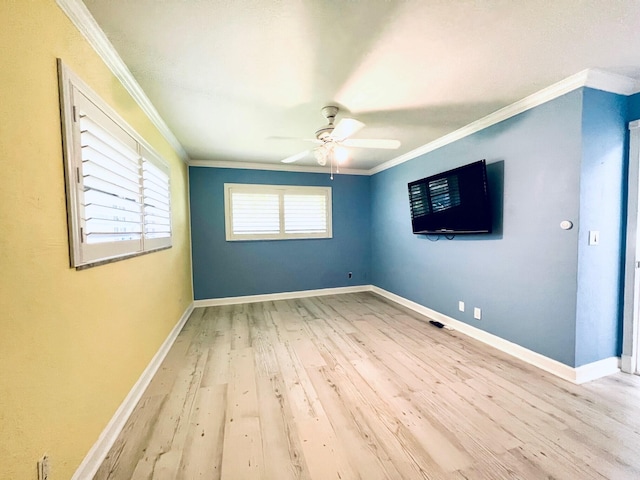 115 Sandpiper Ave, Royal Palm Beach, FL 33411 - empty room with a ceiling fan, crown molding, wood finished floors, and baseboards