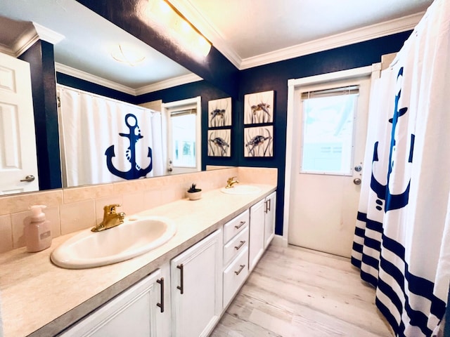 115 Sandpiper Ave, Royal Palm Beach, FL 33411 - bathroom featuring double vanity, wood finished floors, tasteful backsplash, and ornamental molding