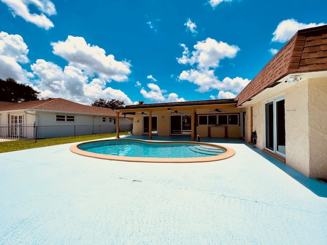 115 Sandpiper Ave, Royal Palm Beach, FL 33411 - view of pool featuring a ceiling fan and a patio