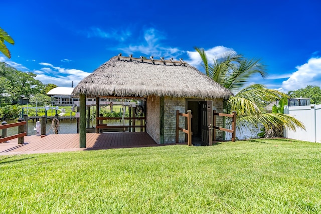 401 SE Verada Ave, Port Saint Lucie, FL 34983 - dock featuring a lawn, a water view, and boat lift
