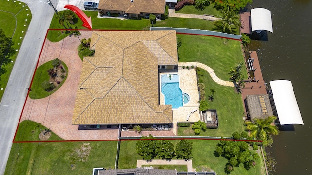 401 SE Verada Ave, Port Saint Lucie, FL 34983 - aerial view of property's location featuring a pool and property parcel outlined