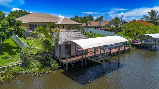 401 SE Verada Ave, Port Saint Lucie, FL 34983 - dock area featuring boat lift and a water view
